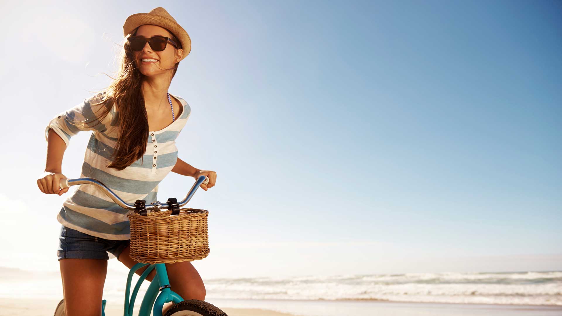 Woman on a beach cruiser