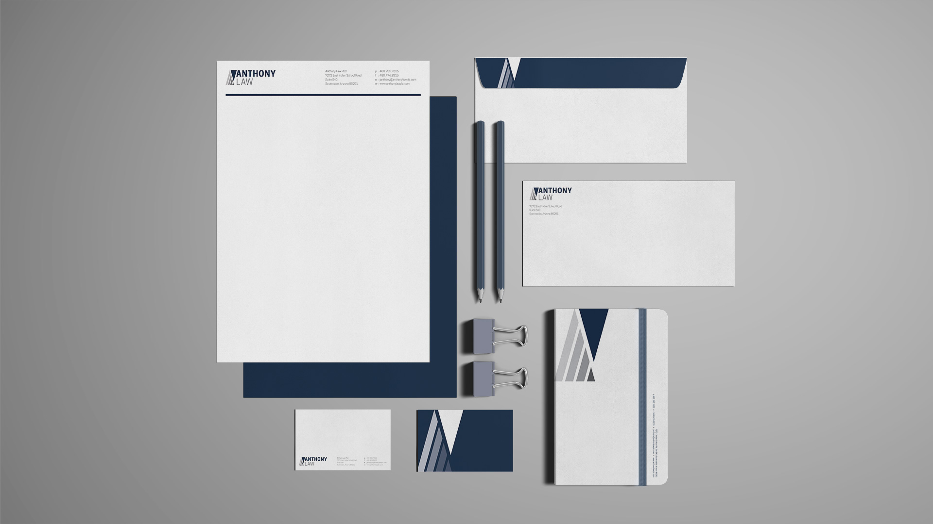 Branded business system for Anthony Law: letterhead, business cards, envelope and notebook