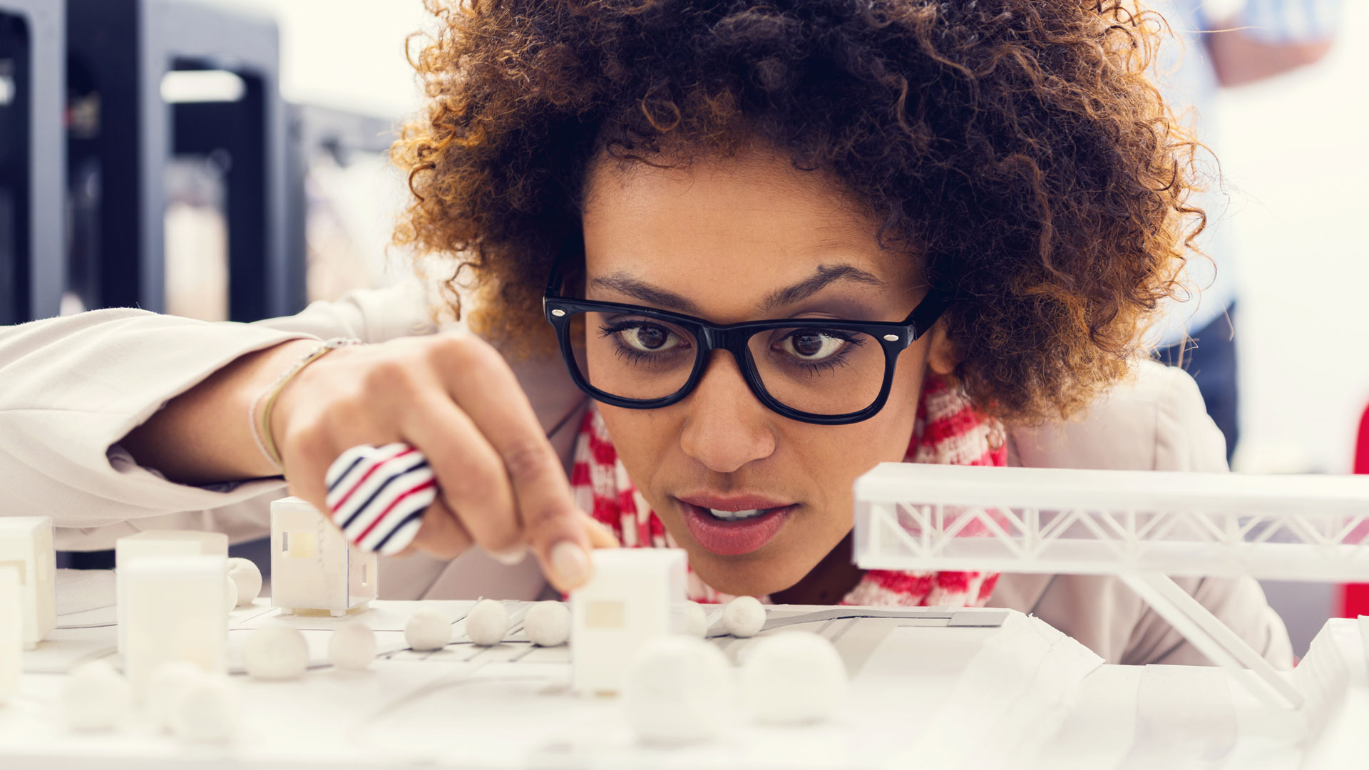 Woman working with 3D printed objects